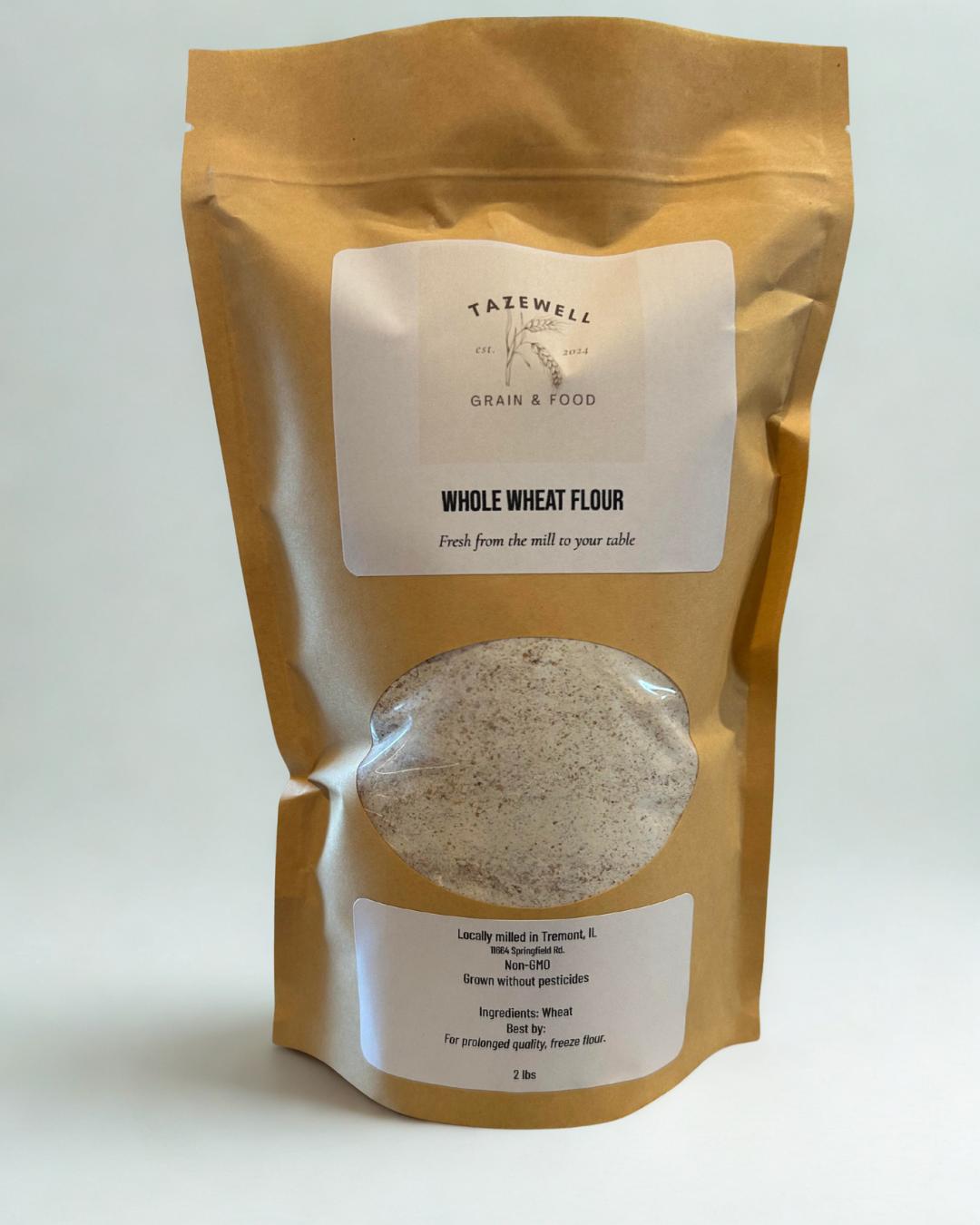 Package of whole wheat flour with a visible brand label on a white background